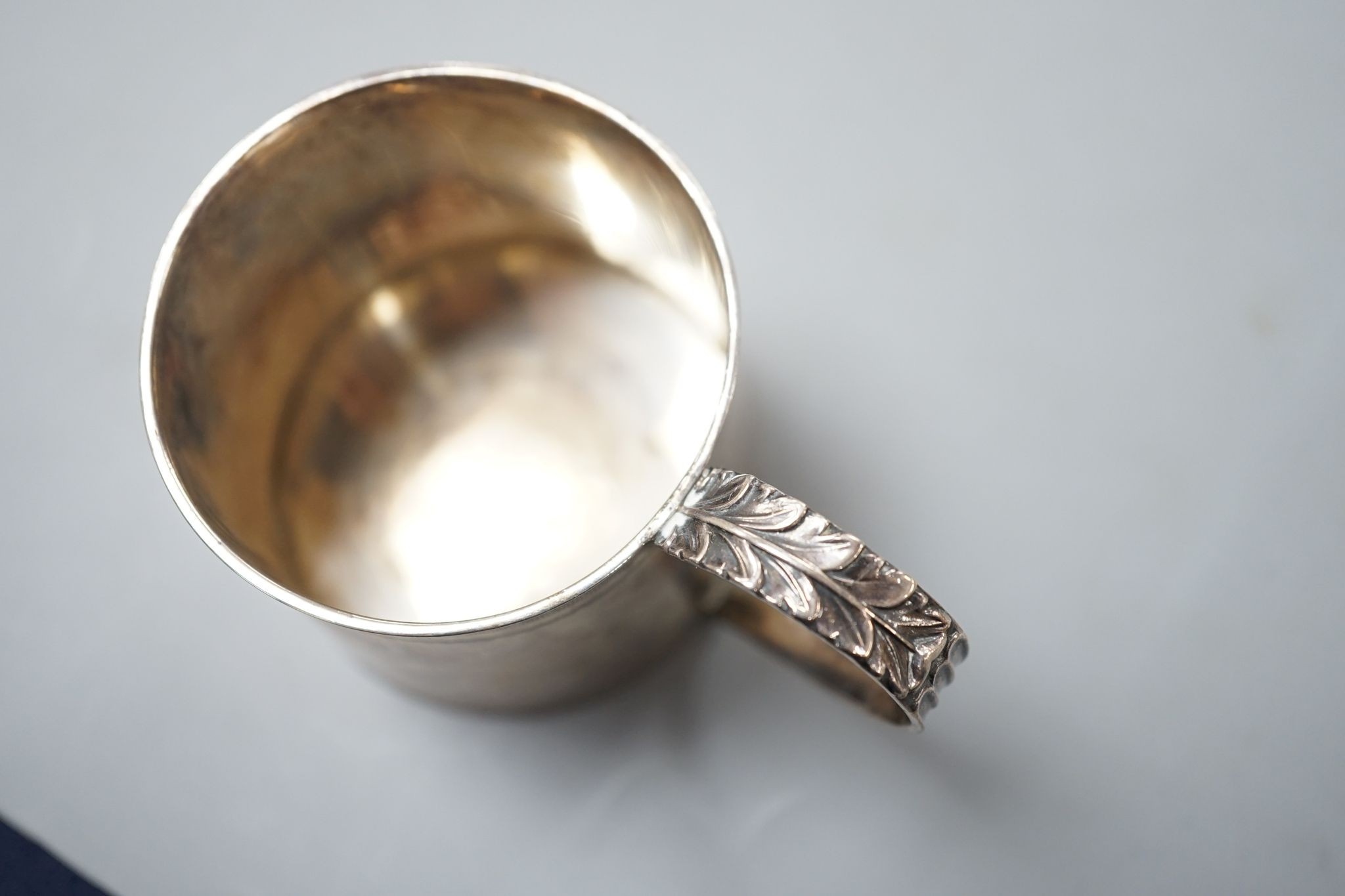 A George III silver small mug, Thomas Wallis & Jonthan Hayne, London, 1818, with engraved monogram, 57mm, 60 grams.